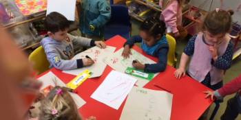 Writing names to claim their bear biscuit